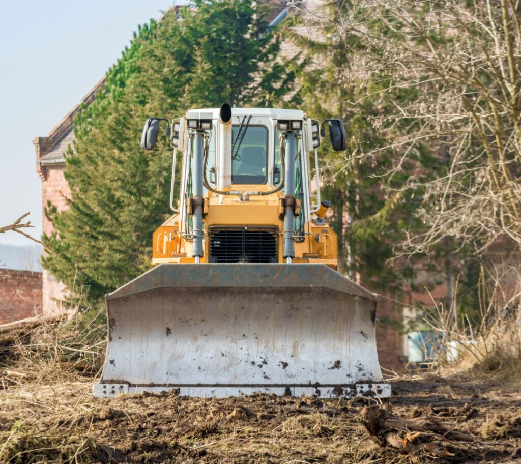 Site clearing and excavation before residential construction project